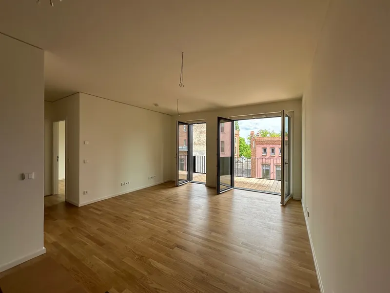 Helle 2-Zimmer-Wohnung mit Einbauküche und Balkon am Wasser — photo 1